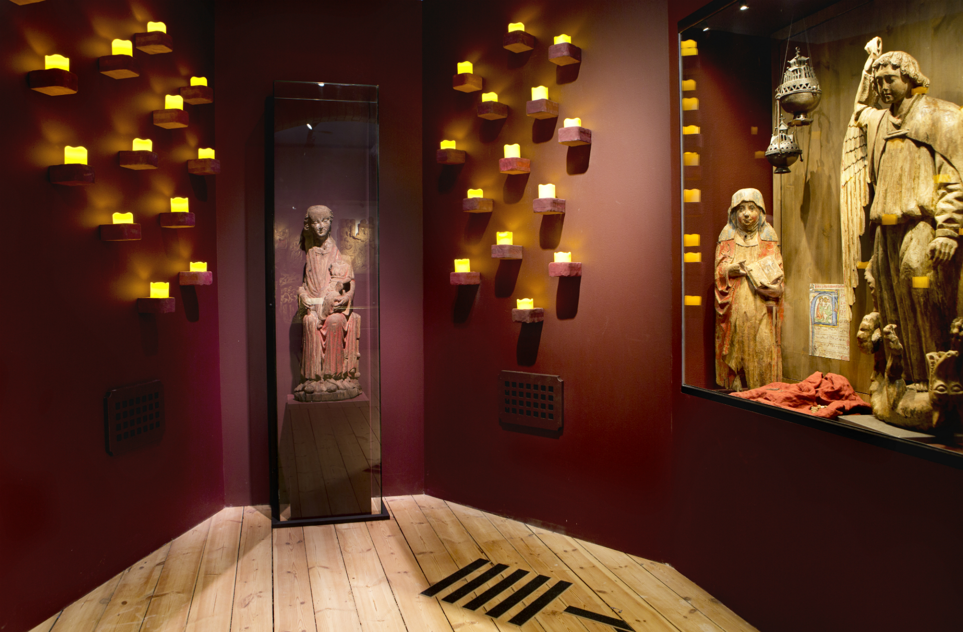 Three divers on a boat.