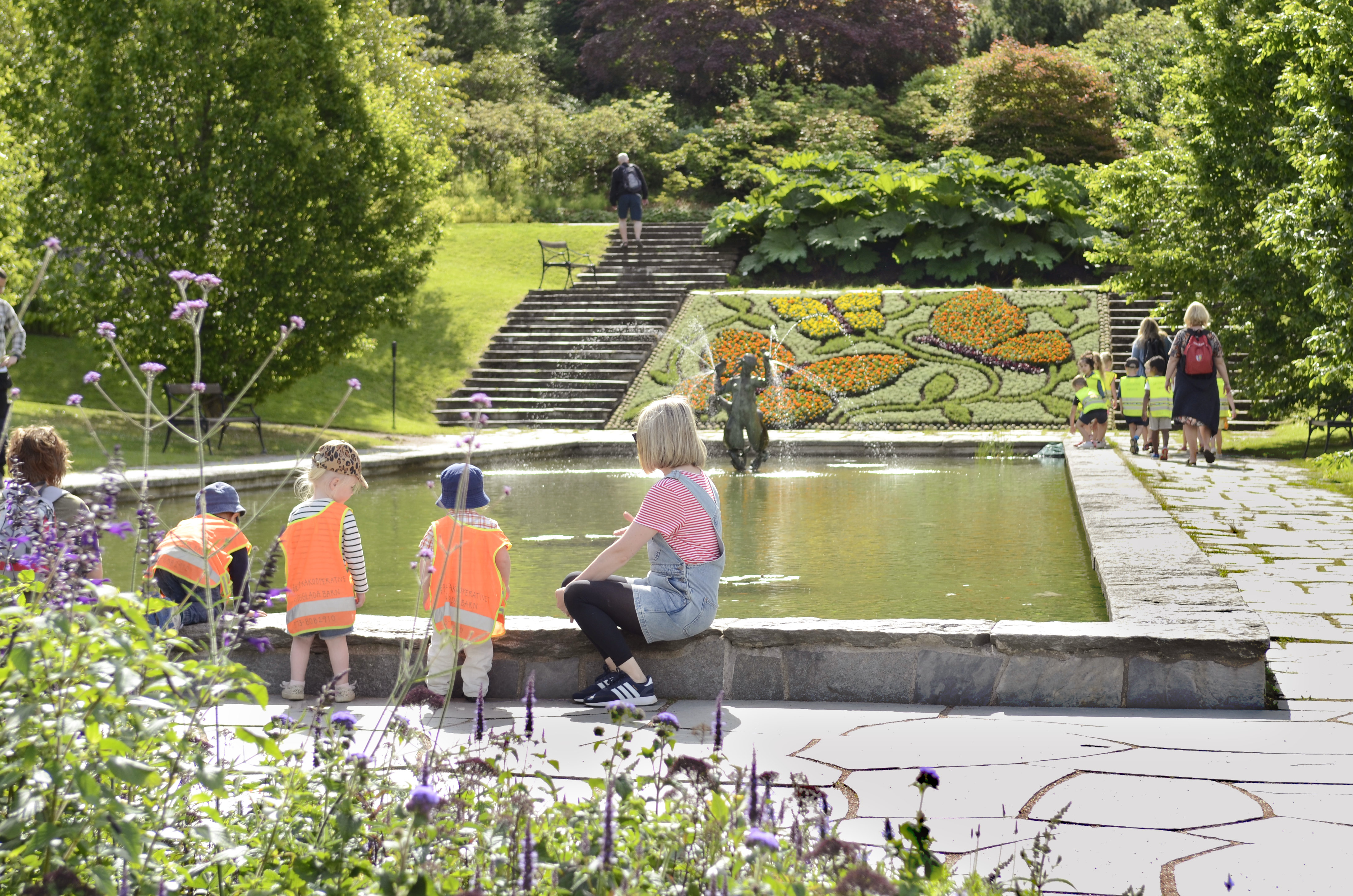 Children by the pond at The Botanical Gardens in Gothenburg