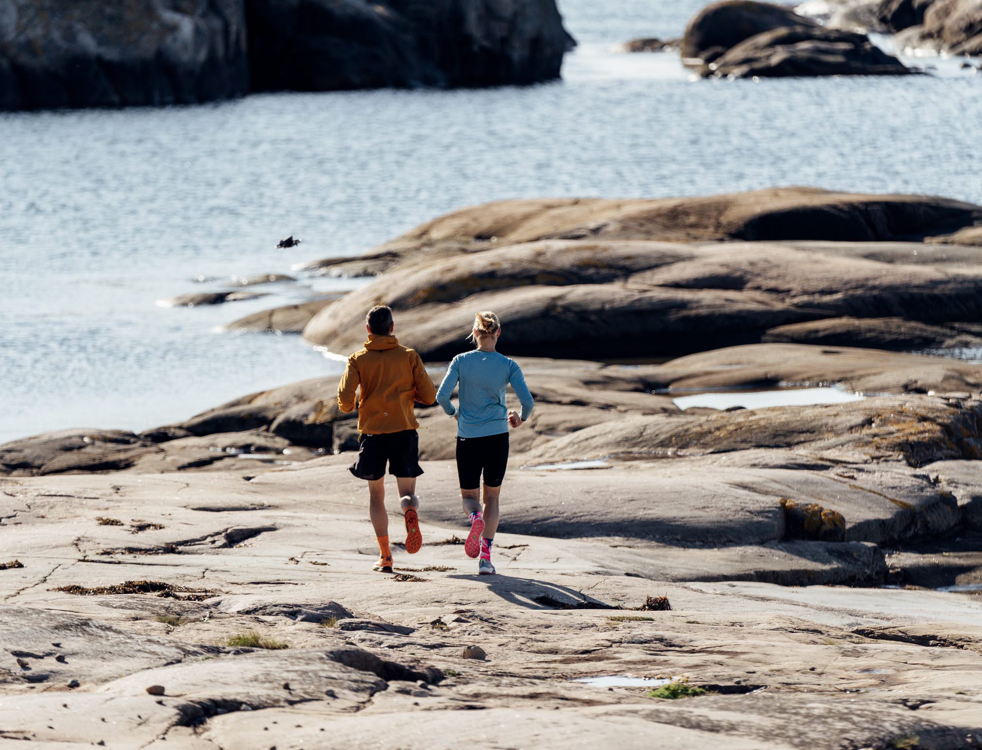 Trail runners on the cliffs on the Swedish west coast.