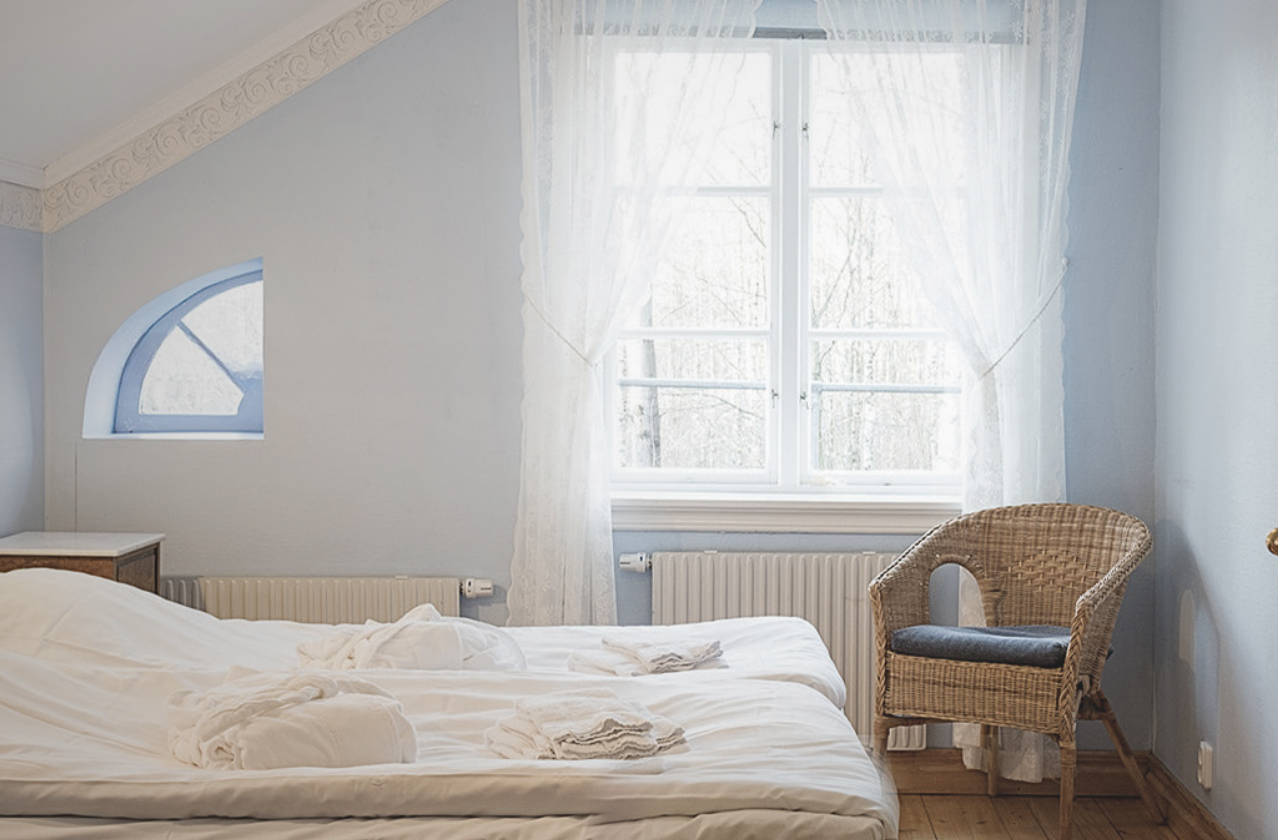 A double bedroom at Nordiska Konferens och Bed & Breakfast