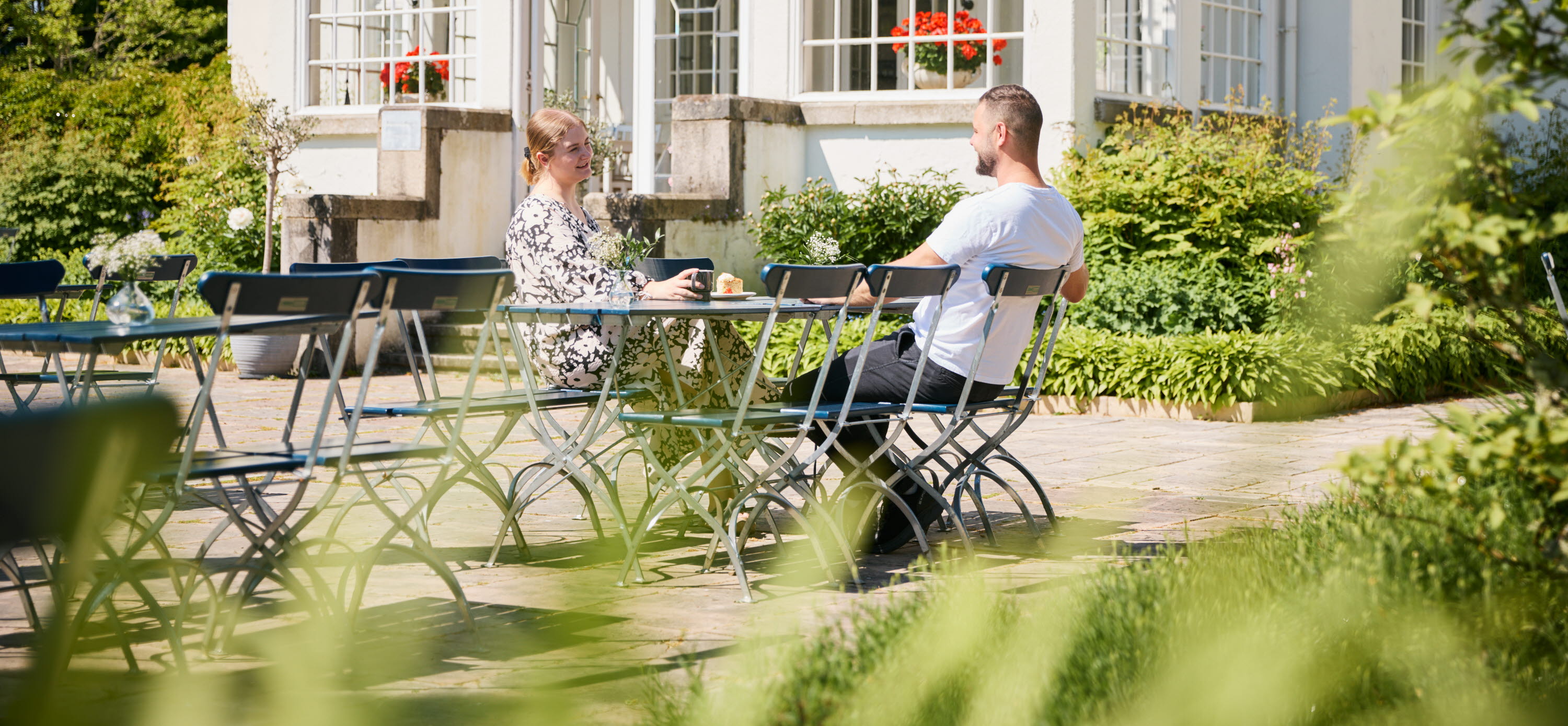 People hanging out in a mansion.