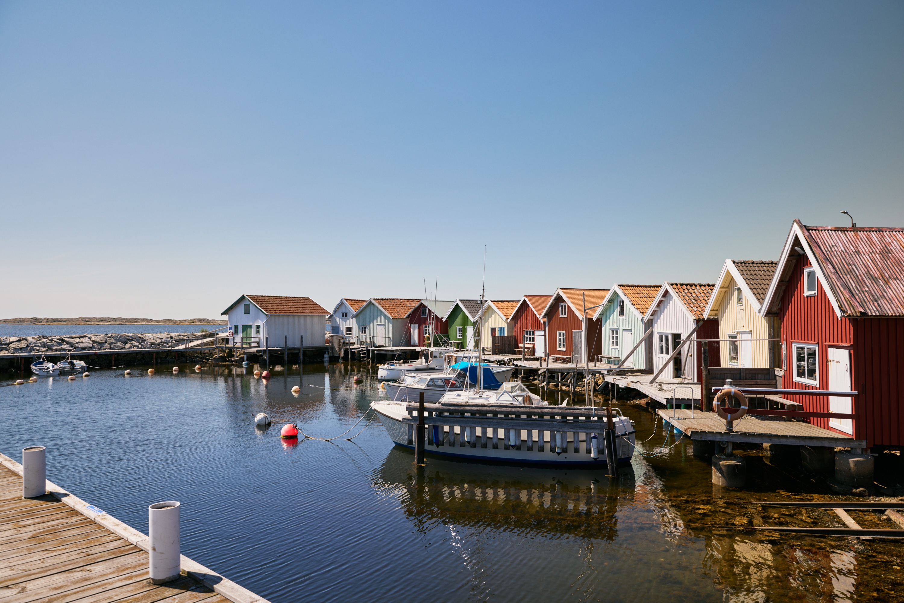 Two people are cycling on an island.