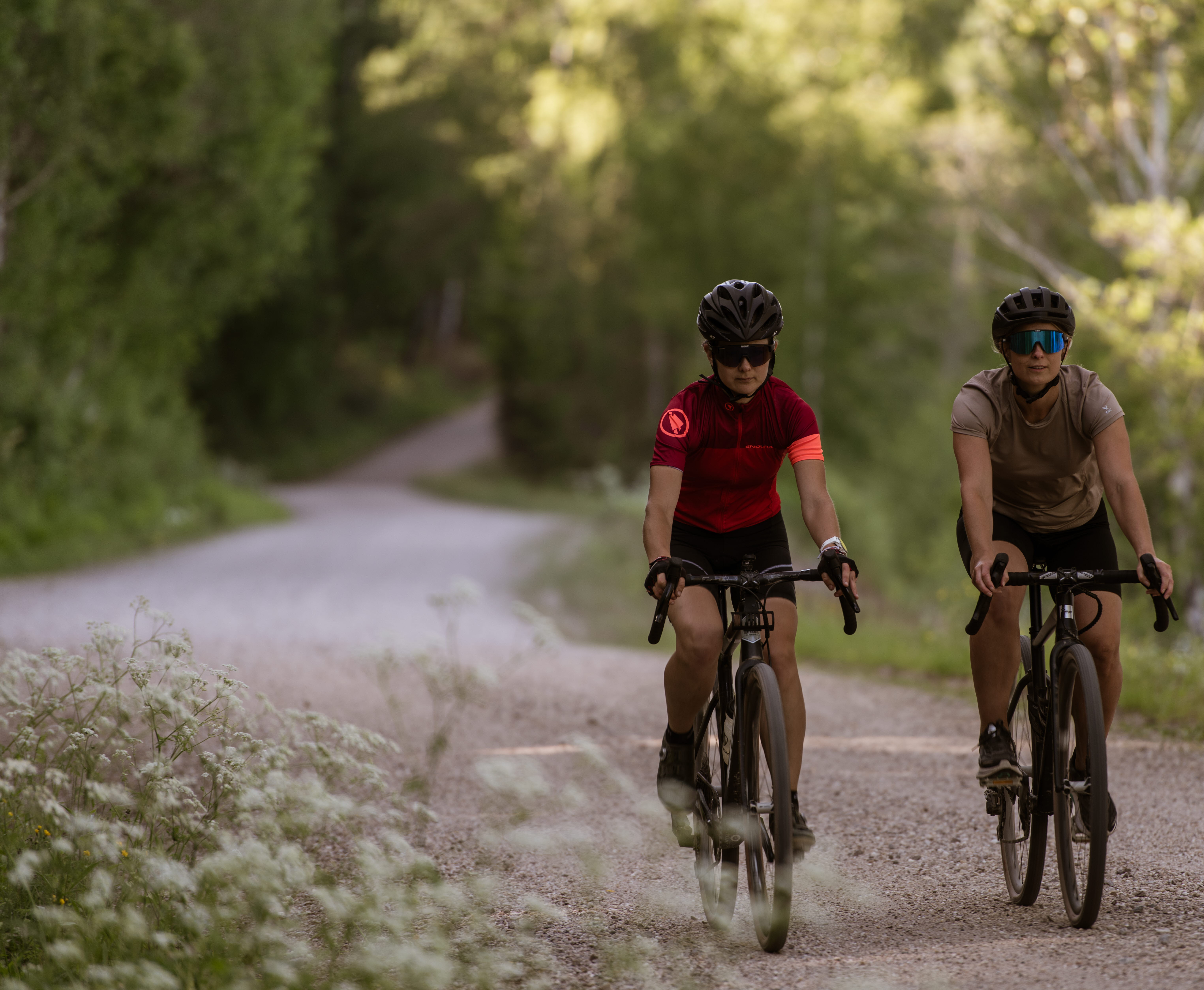 Cyclists on a dirt road,