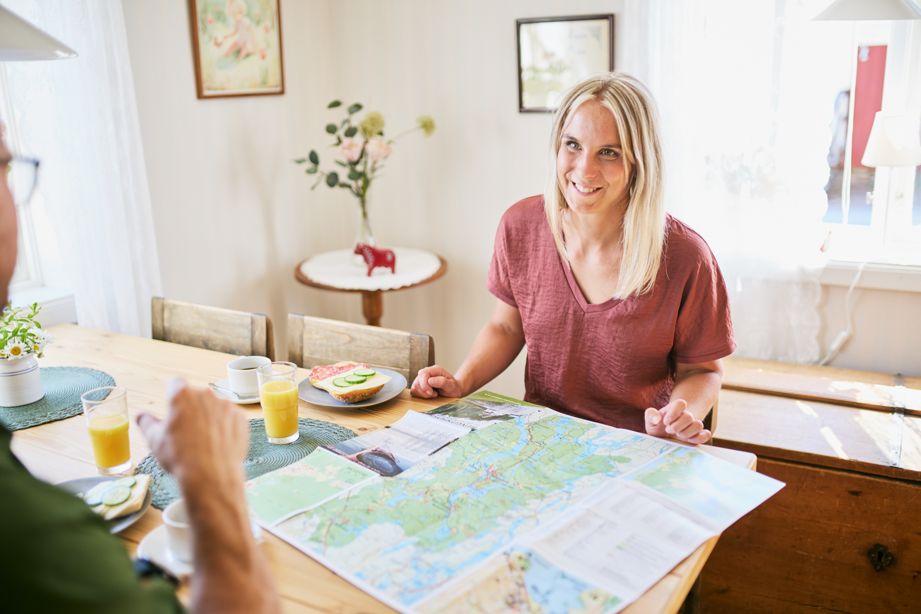 A woman sitting with a book.