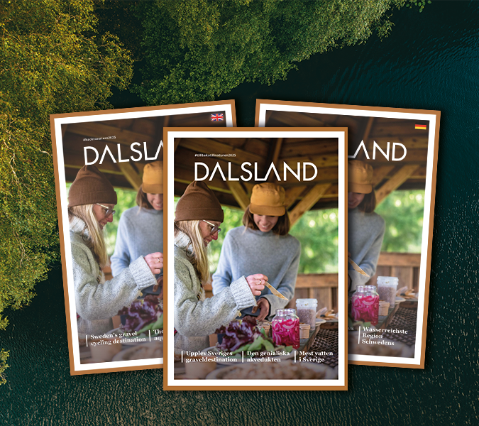 A woman sitting with a book.