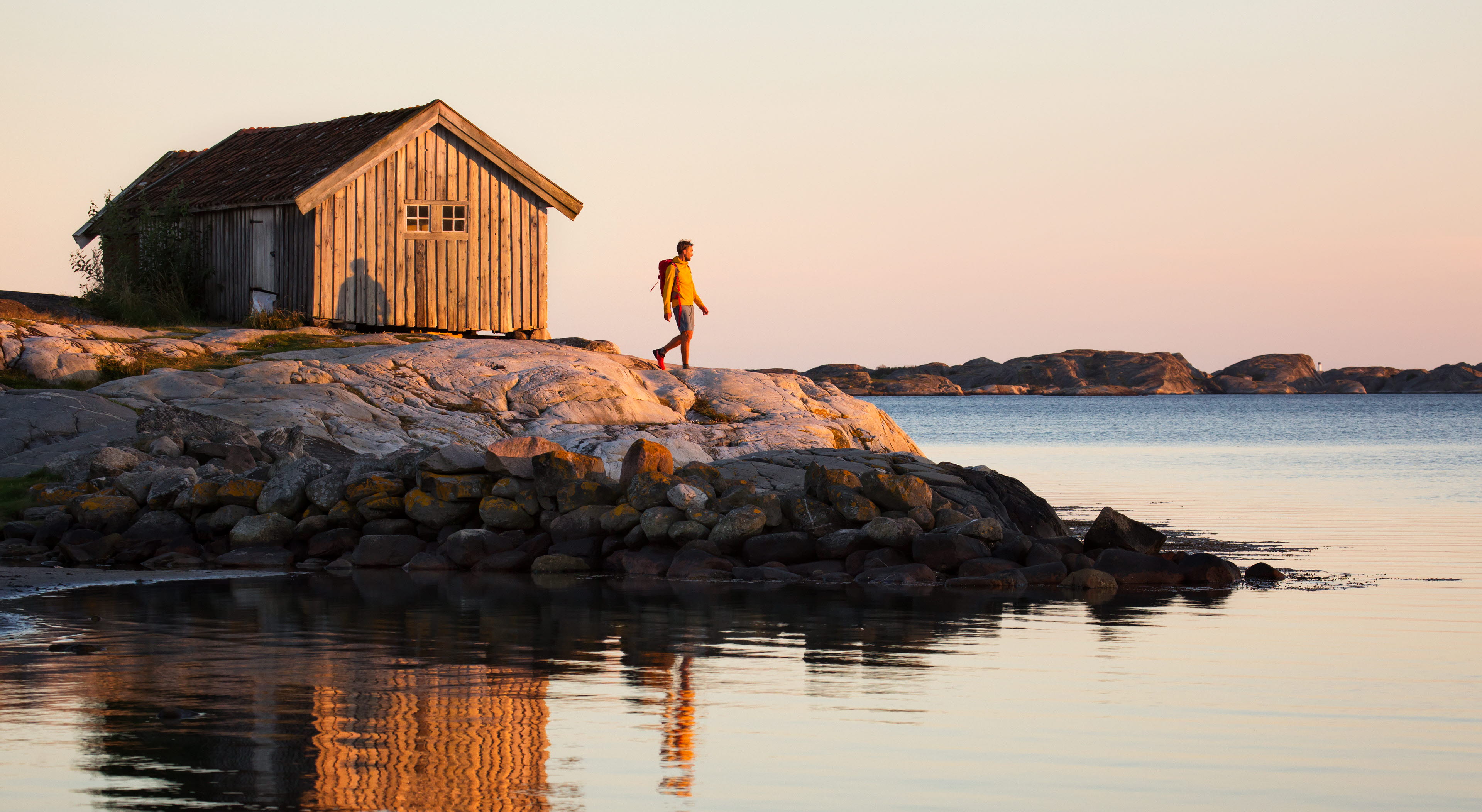 Walking by the ocean at sunset