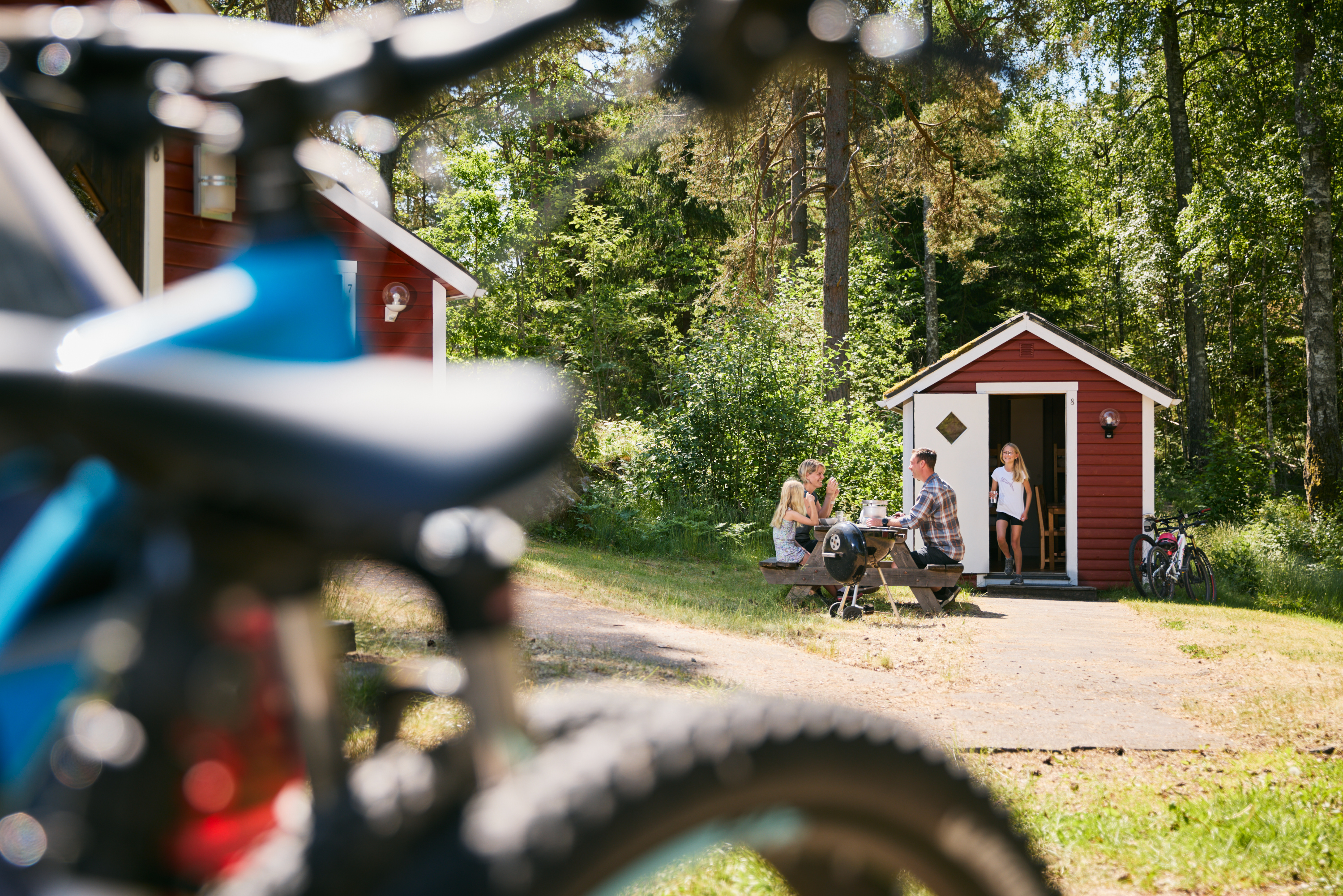 Family at a camping cabin.