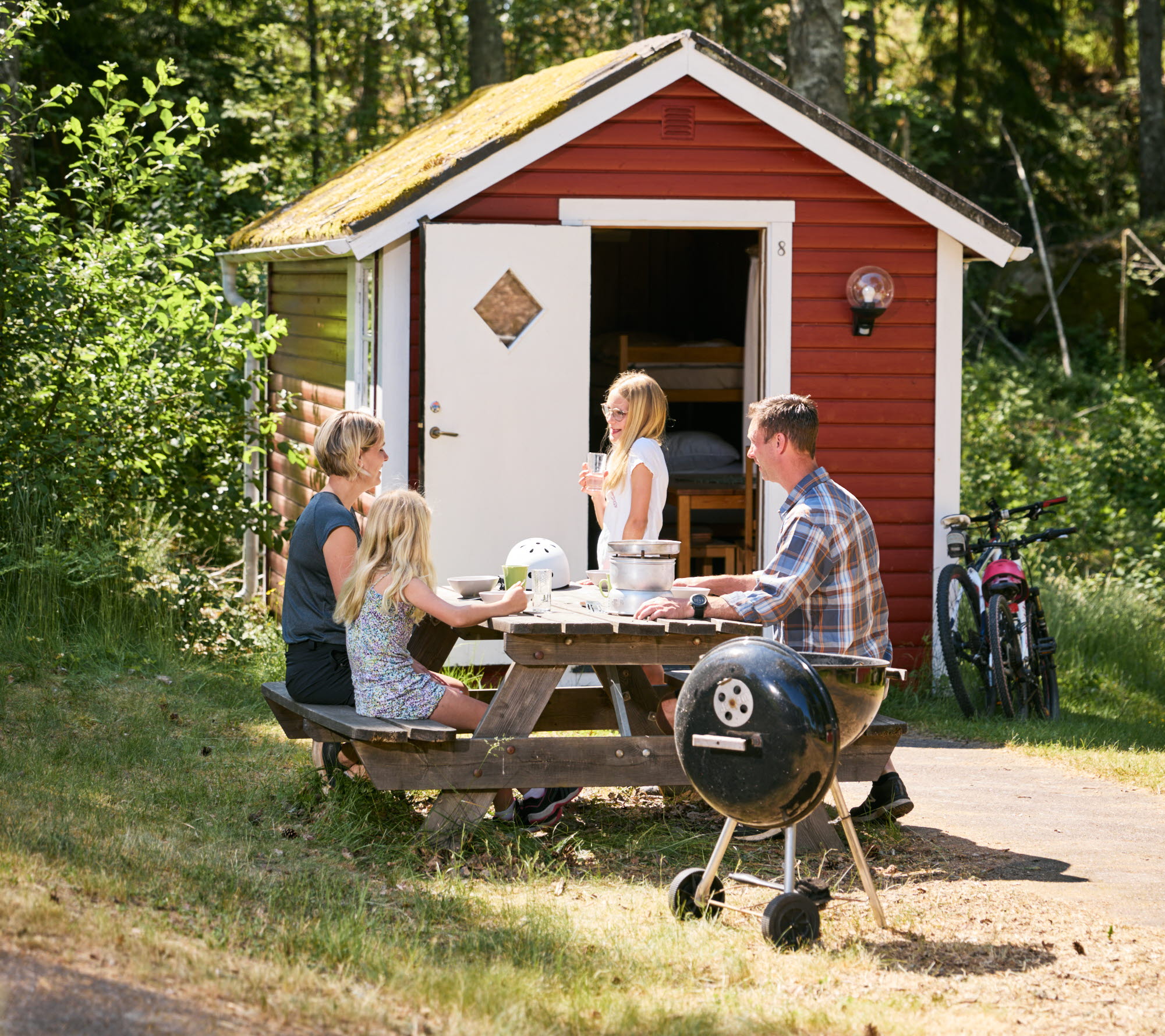 Family at a camping cabin.