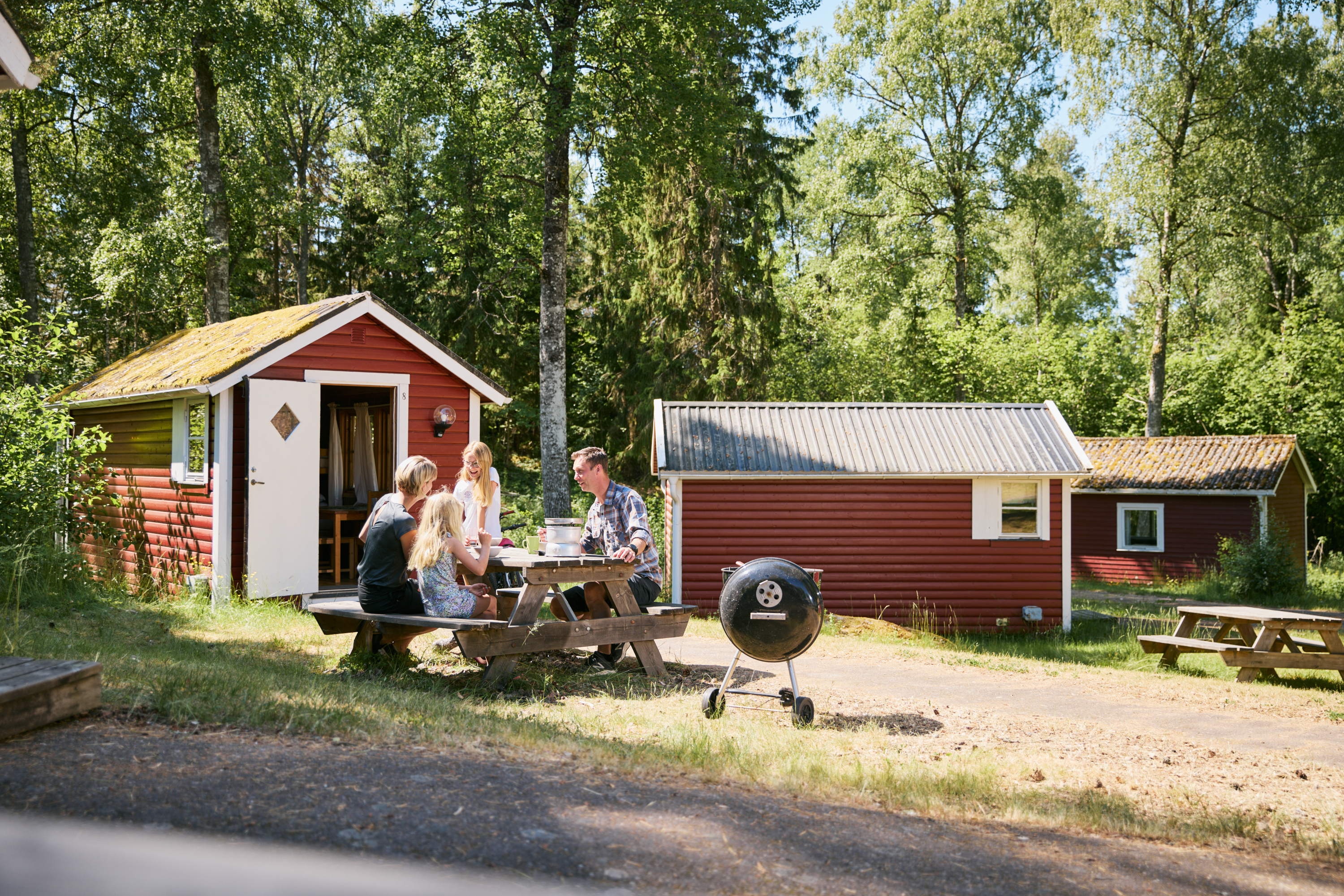 Family at a camping cabin.