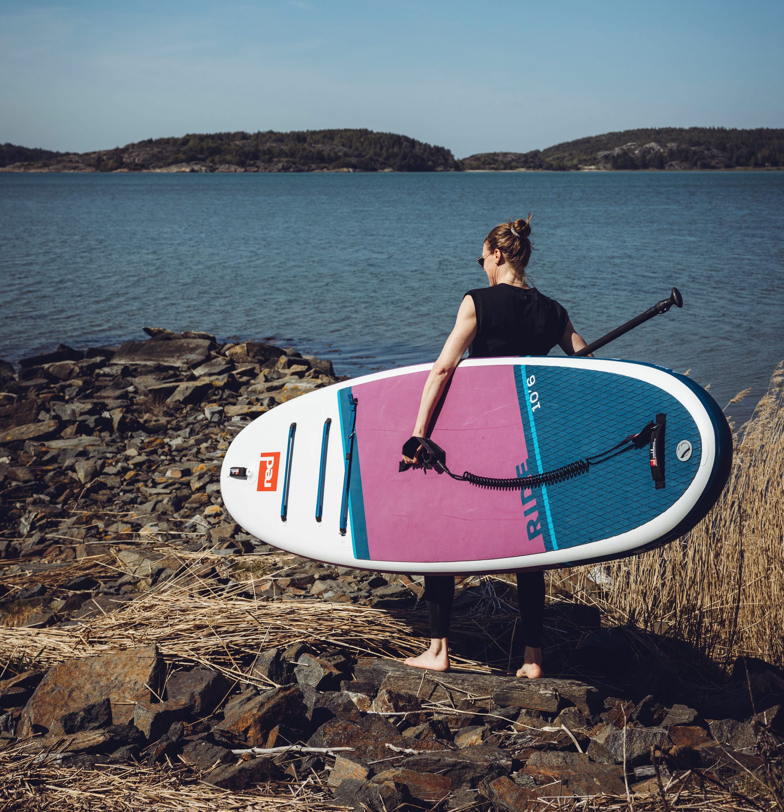 Woman on a stand up paddleboard.
