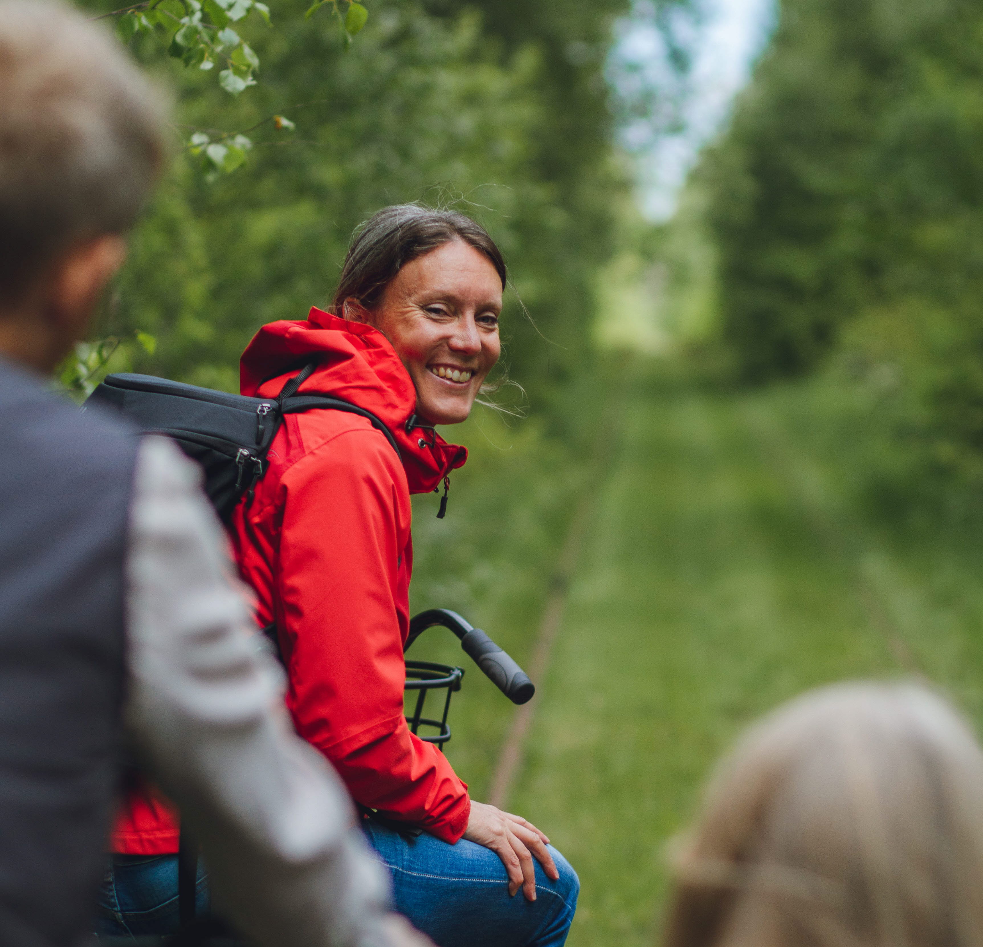 Friends on railway push trolley.