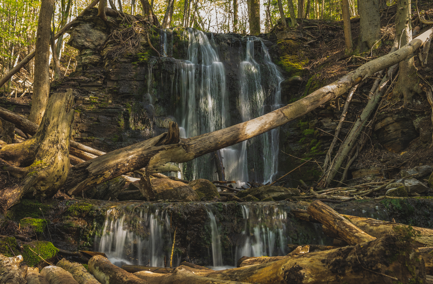 A rushing waterfall through beautiful nature.