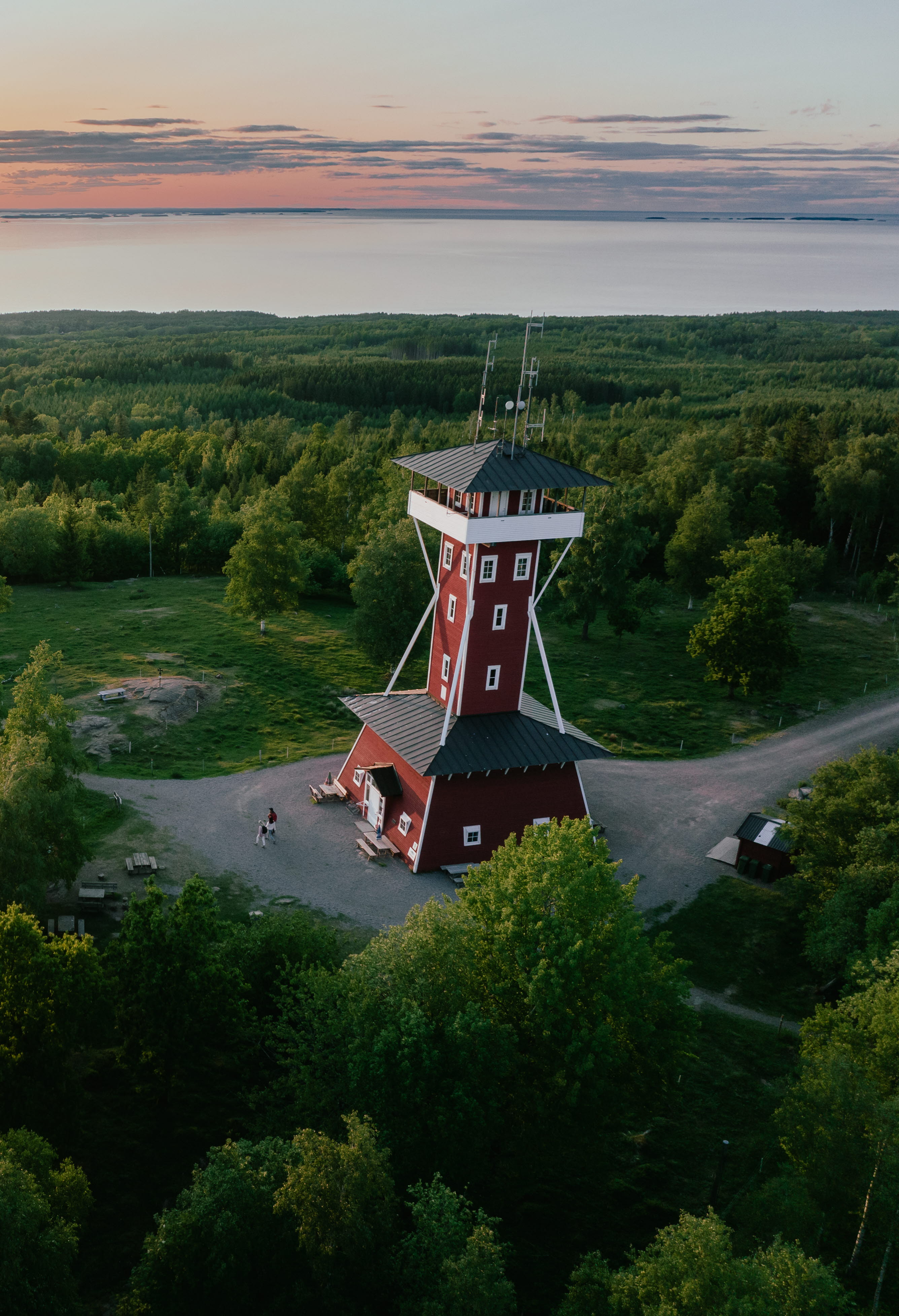 Drone picture over Kinnekulle observatory tower and lake Vänern