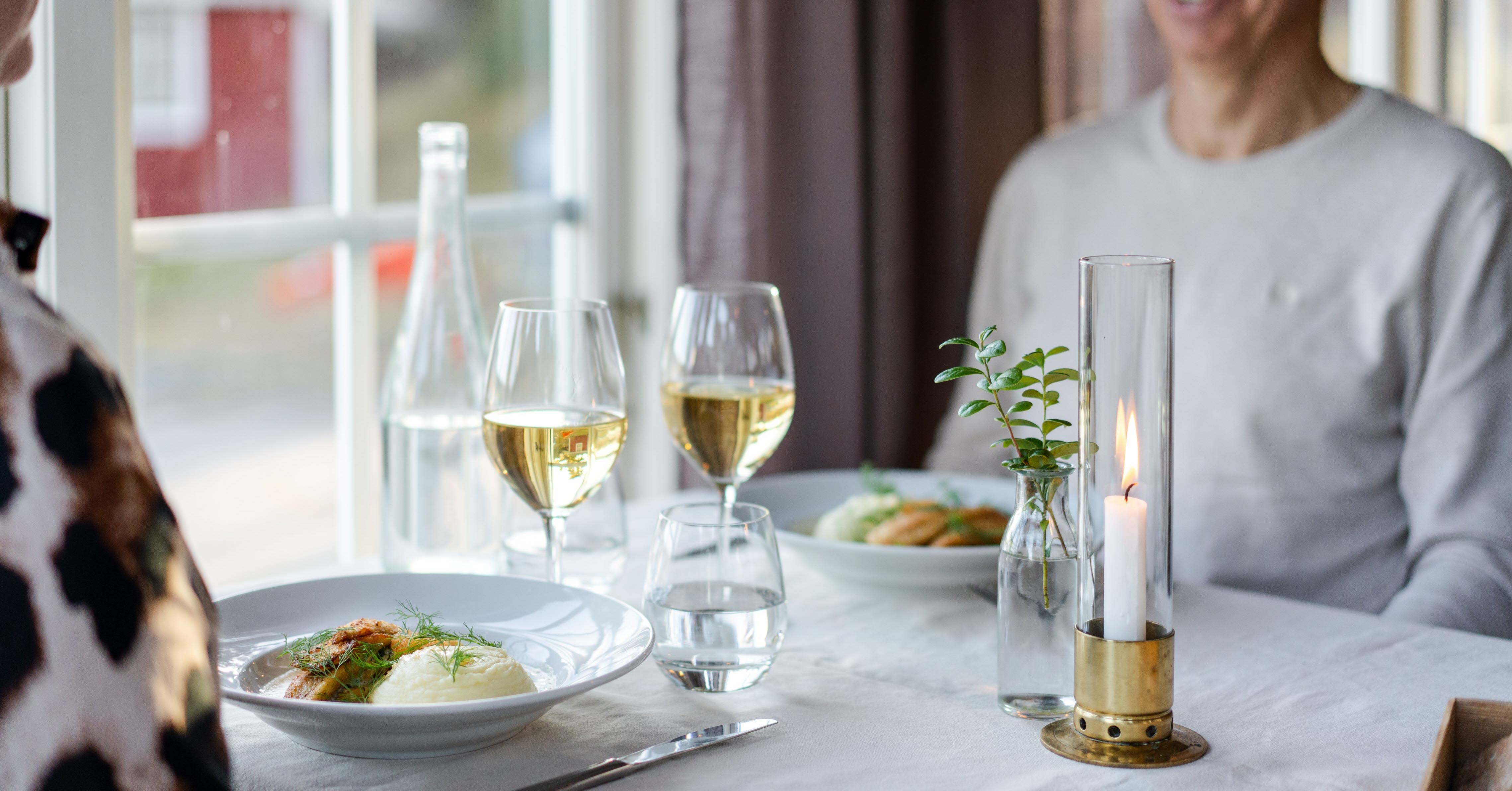 Two person dining at a restaurant. 