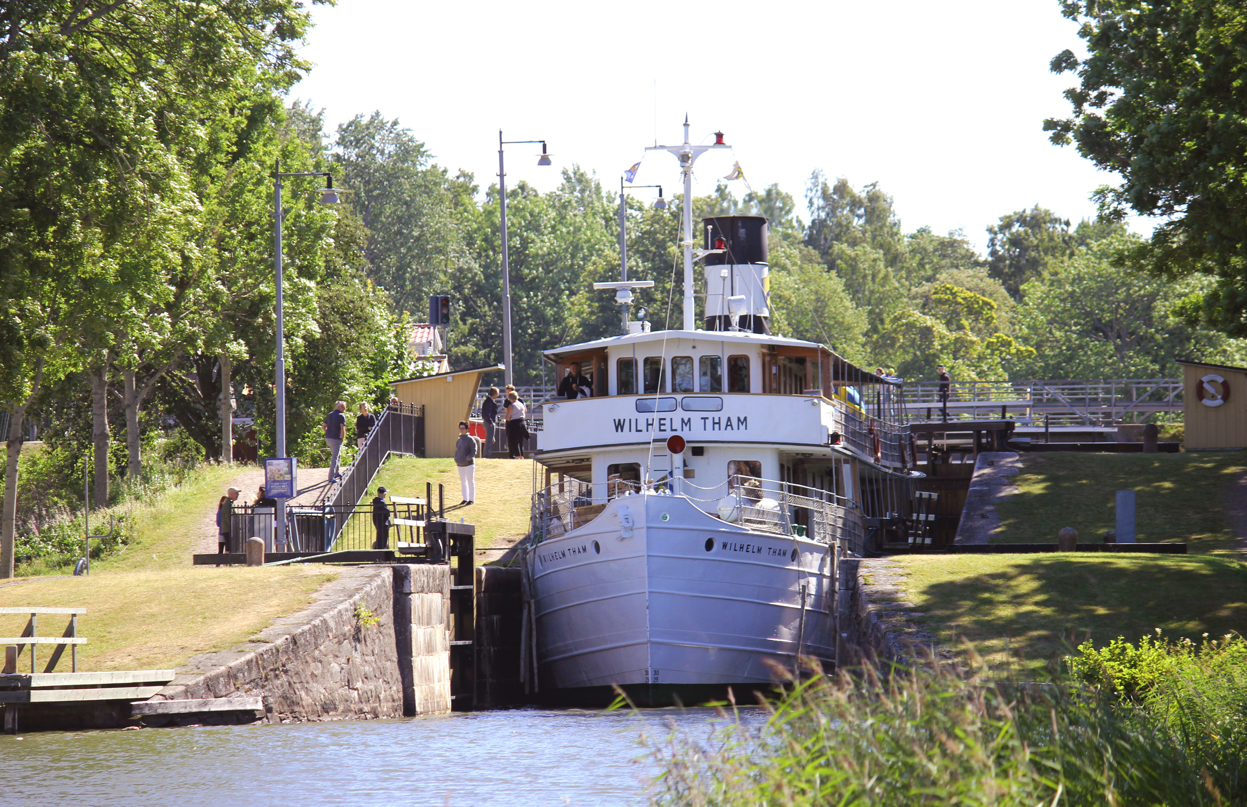 Passenger boat Wilhelm Tham going through locks in Göta Canal. 