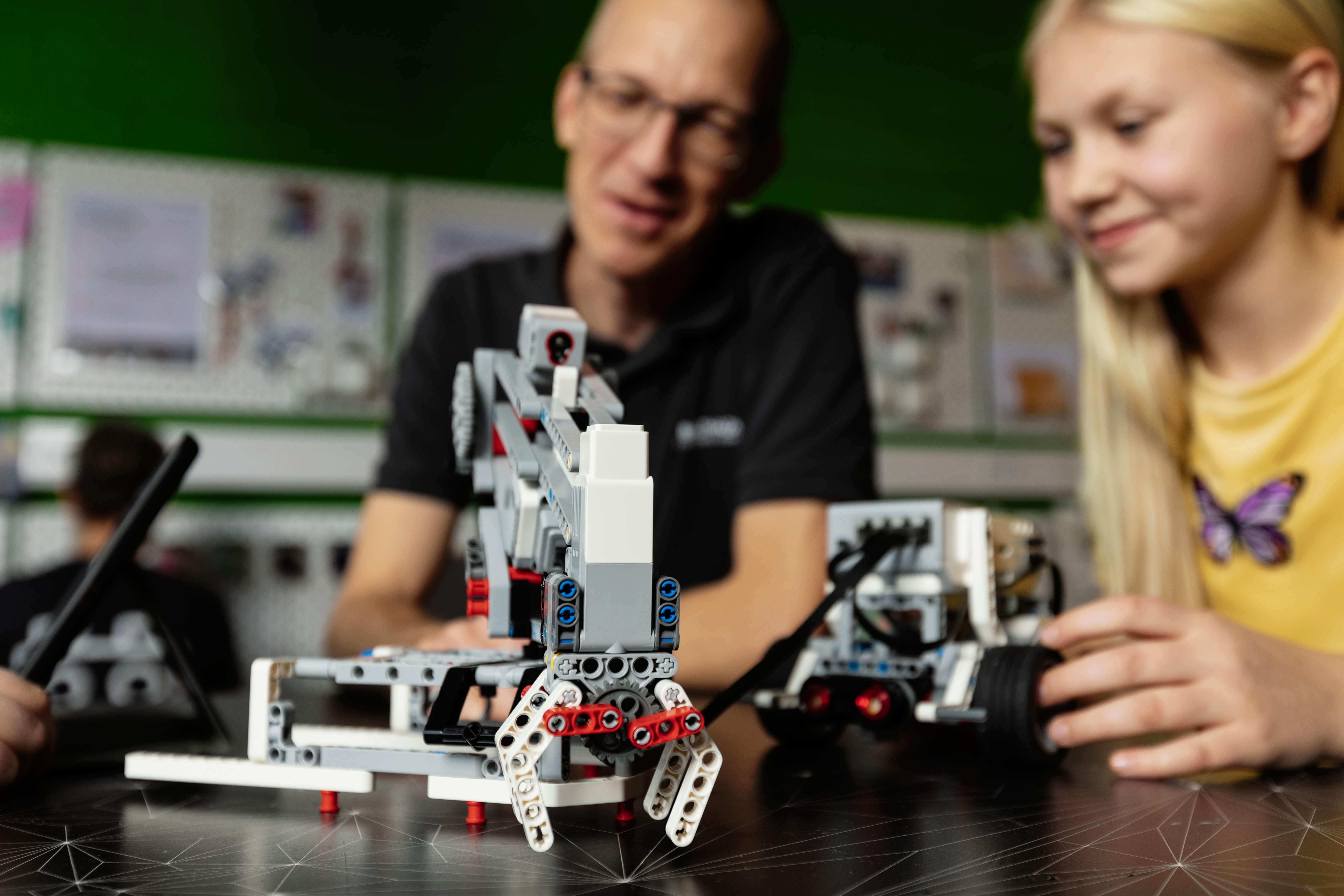Family doing experiments on a science center