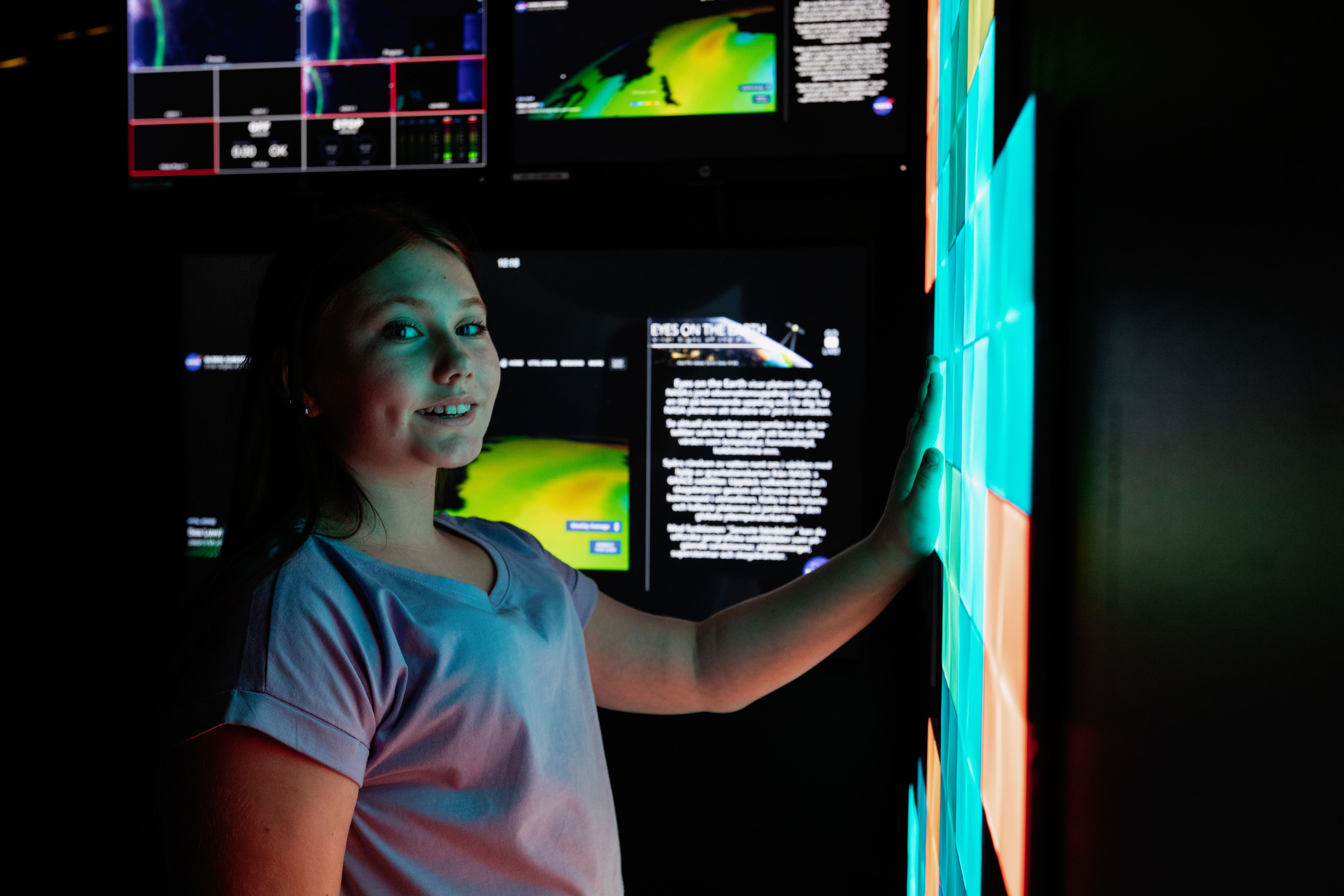 A person doing experiments on a science center