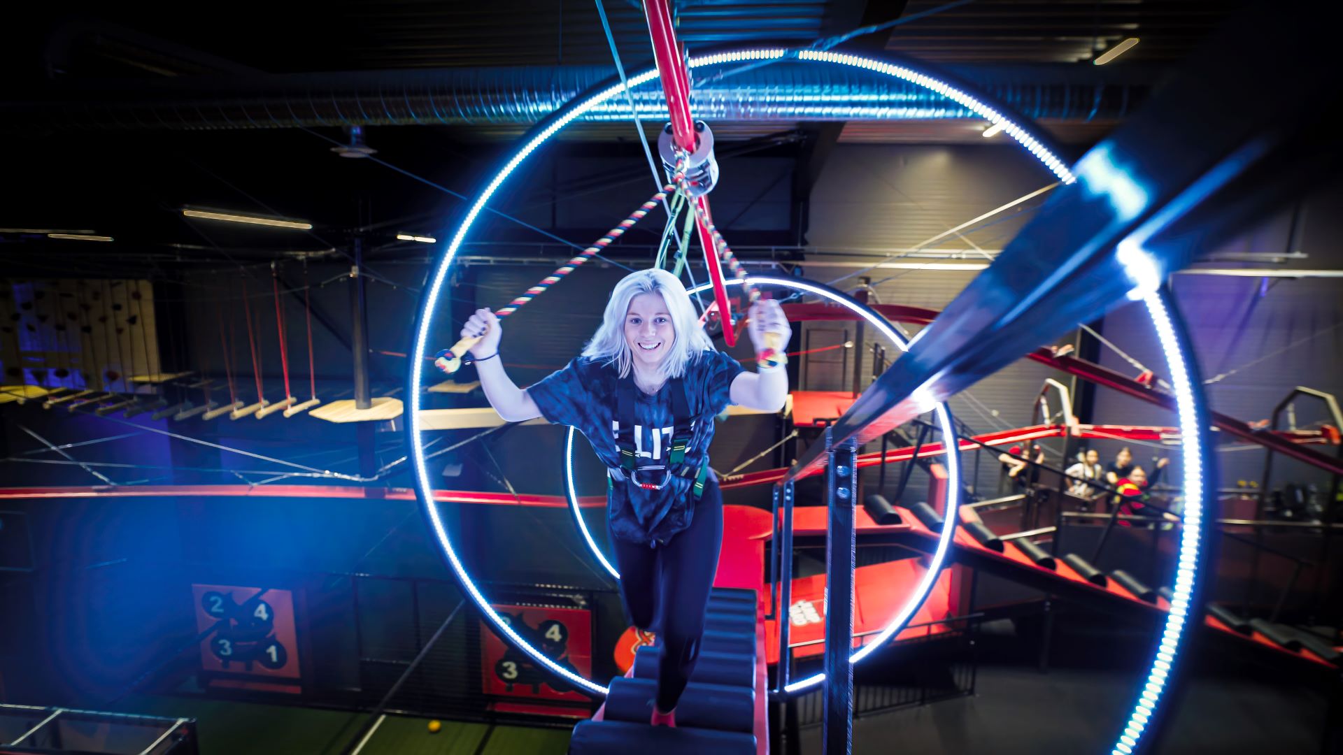 A young adult woman at JumpYard.