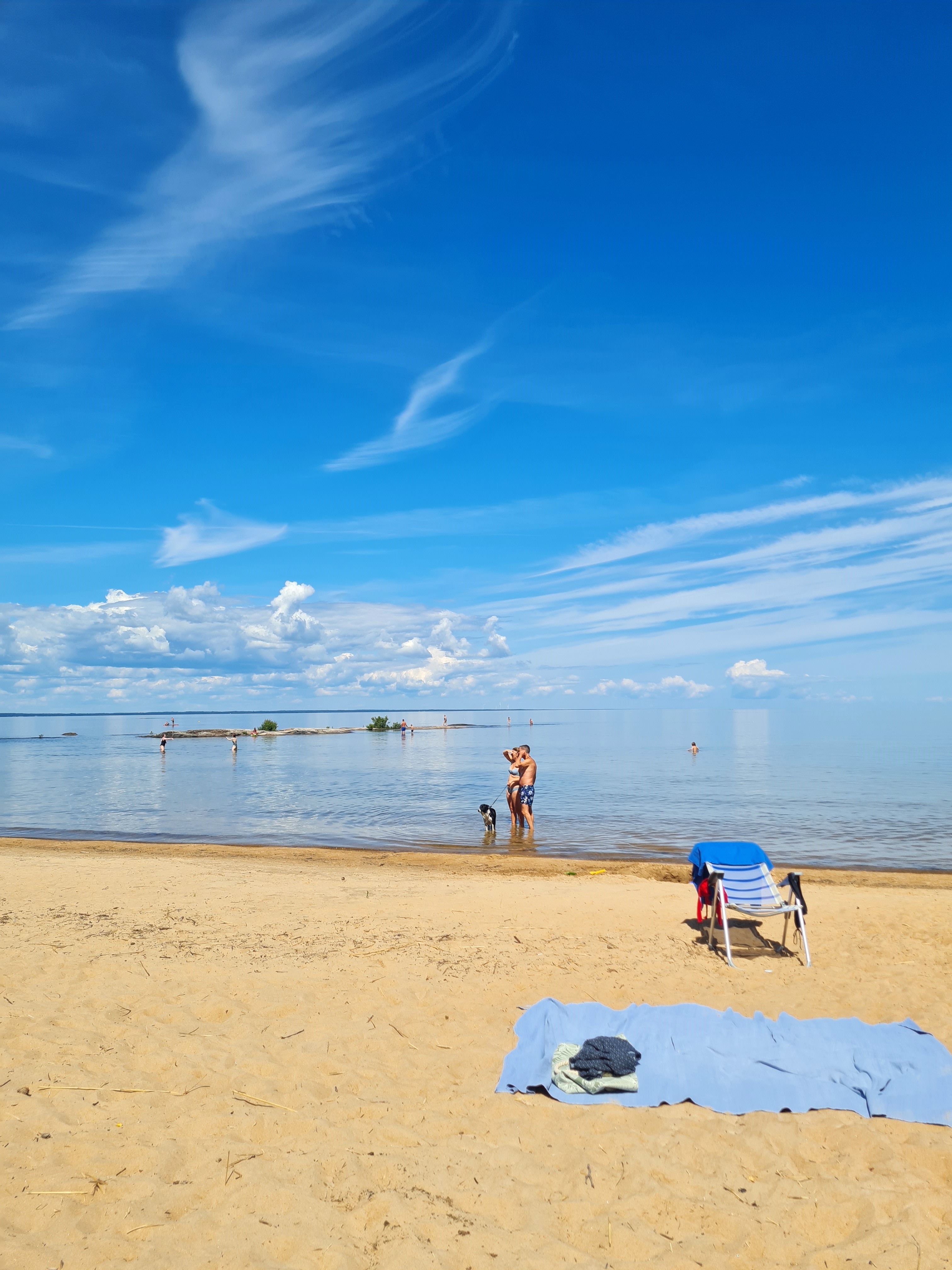 people walking in the lake at the beach Gaddesanna a sunny day