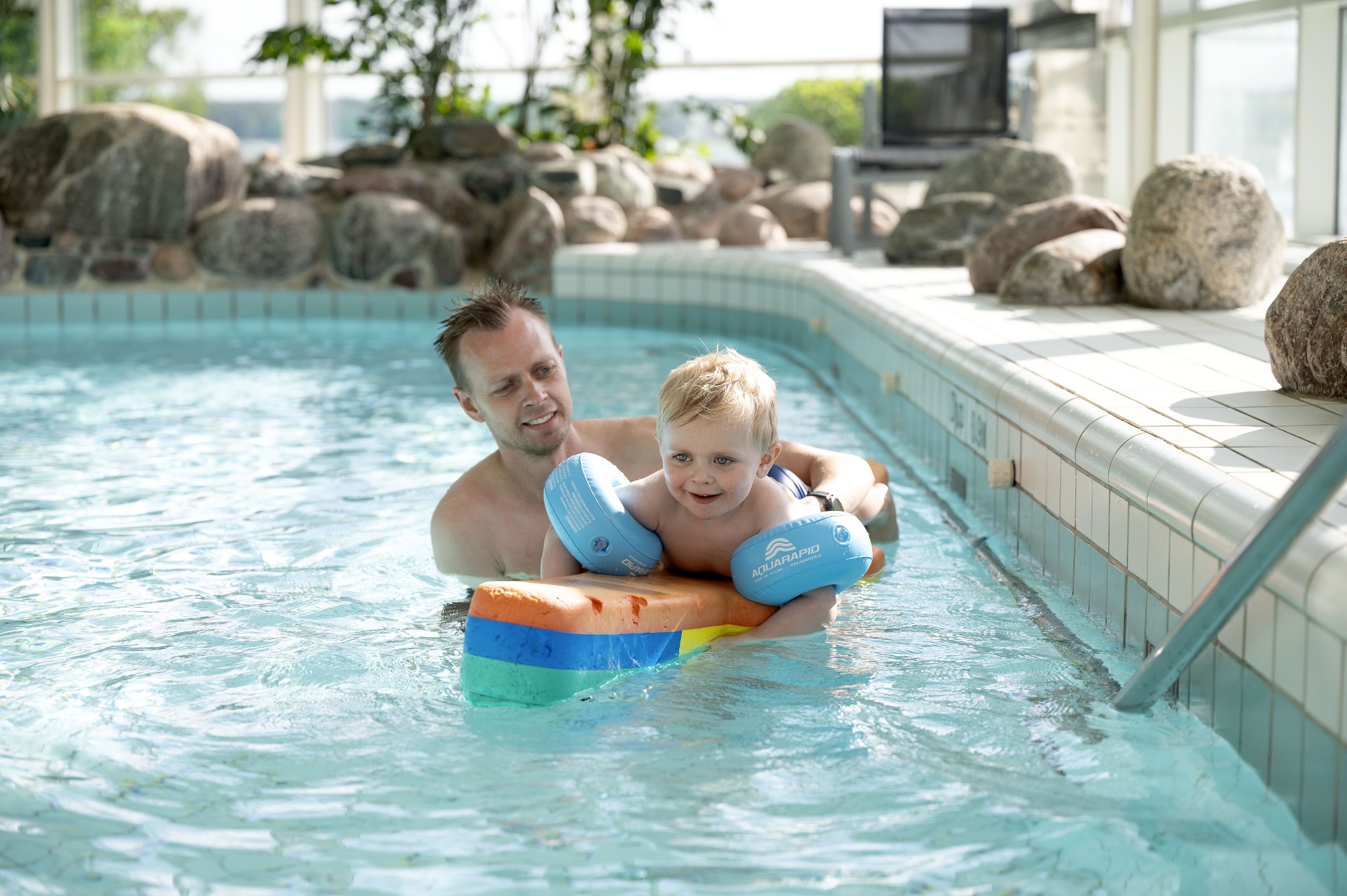 Kids going in a water slide at Vattenpalatset in Vänersborg 