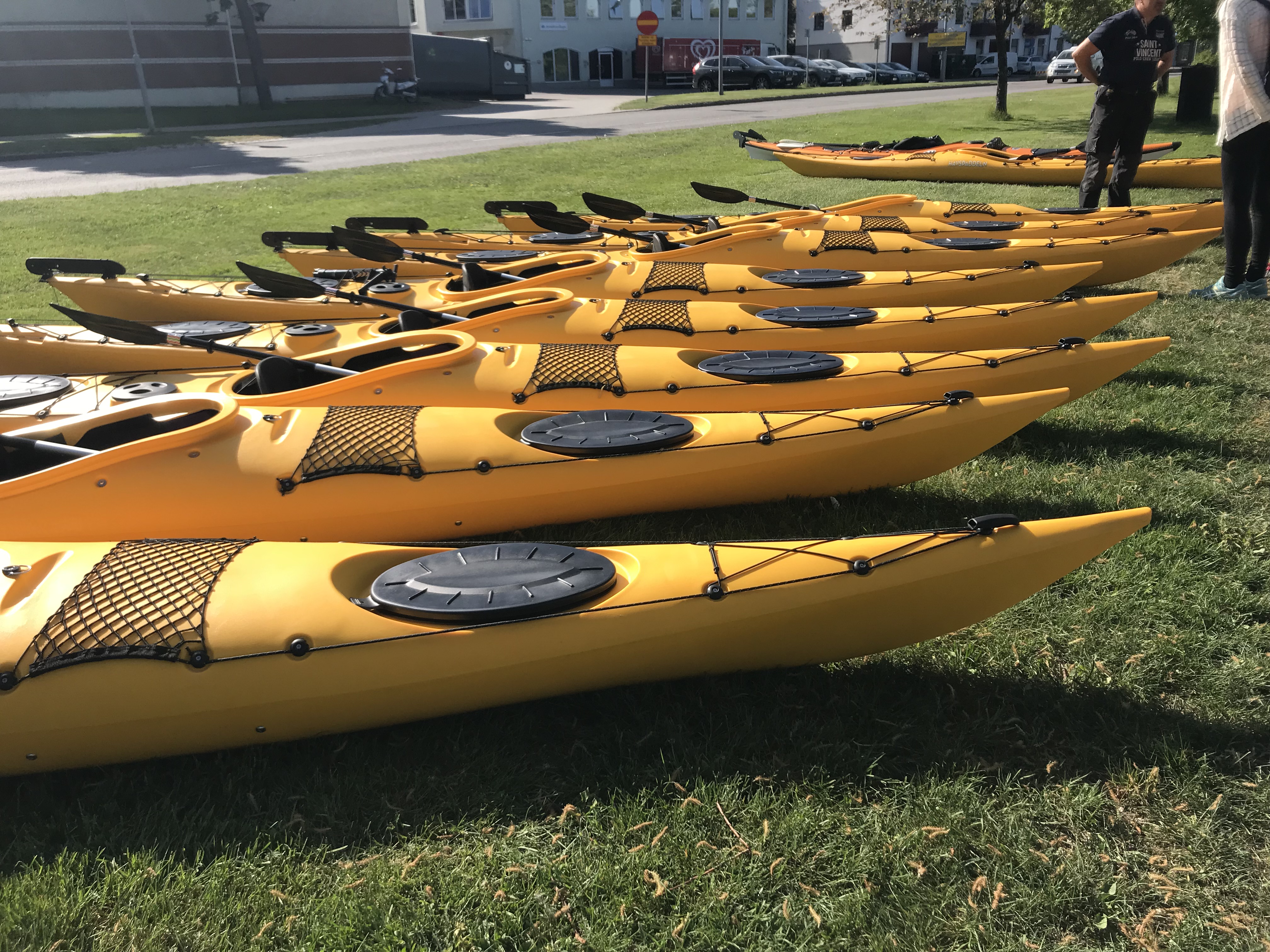People canoeing on the blue lake