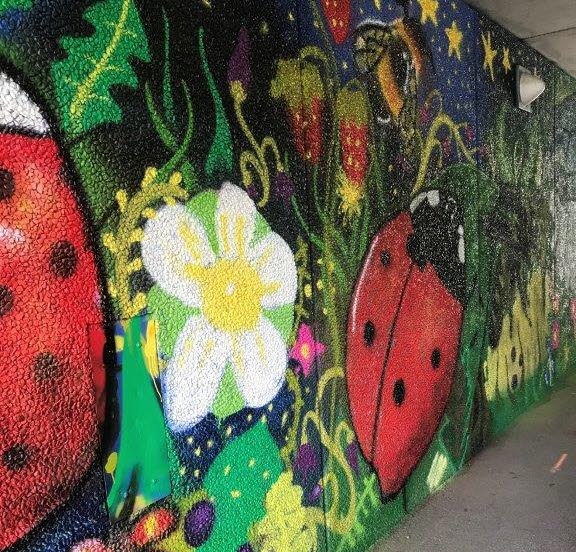 Colourful paiting on a concrete wall 